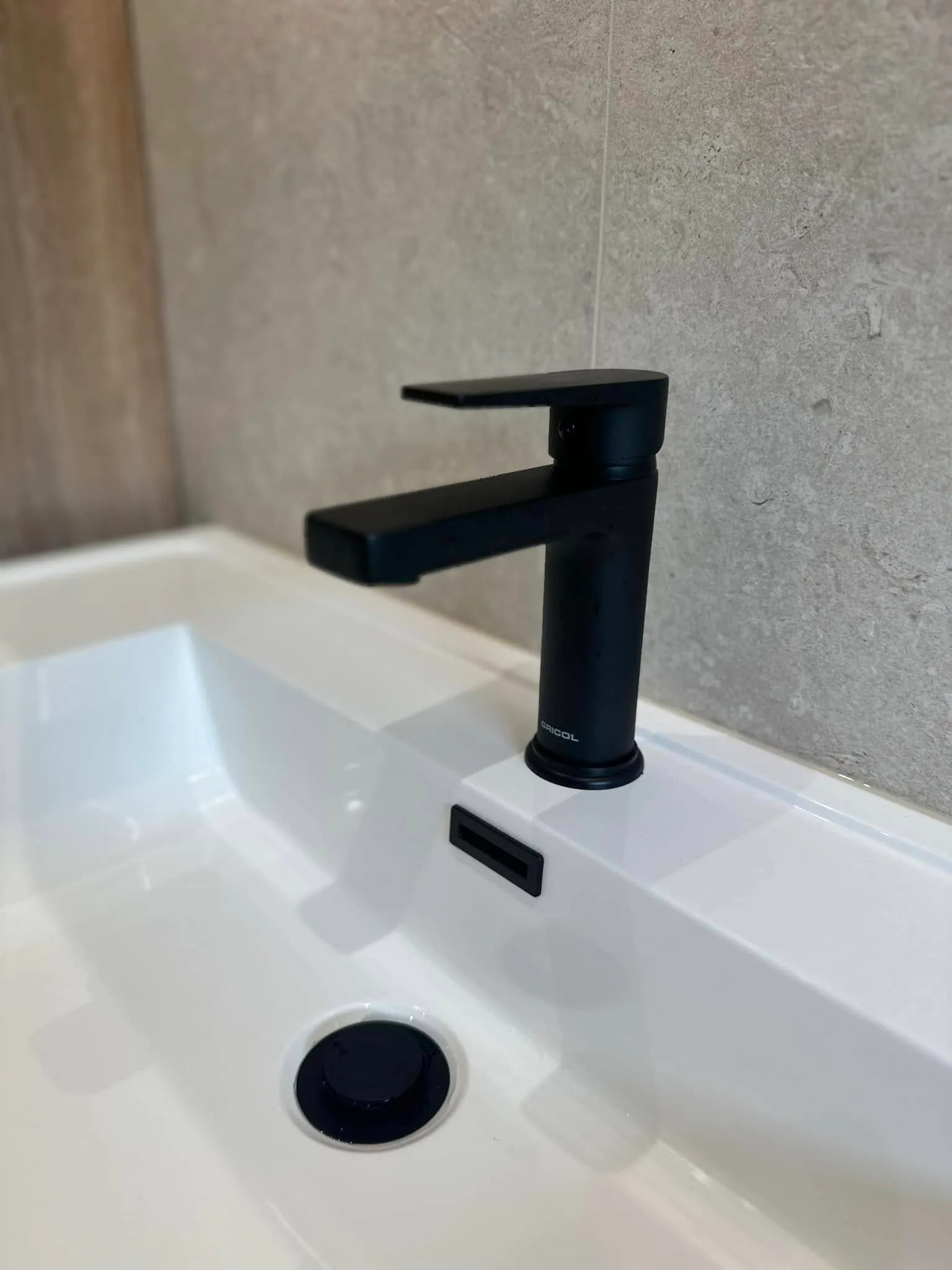 Matt black basin tap detail